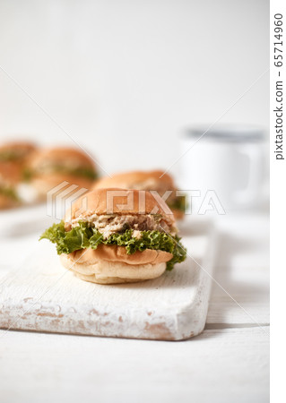 Tuna mini burger on table . 65714960