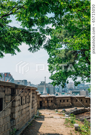 Naksan fortress wall road and Seoul cityscape in Seoul, Korea Naksan fortress wall road and Seoul cityscape in Seoul, Korea 65715050