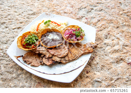 Mexican cuisine Chichen Itza restaurant Chocolate sauce with sauce Taco and meat dishes Mexican cuisine Chichen Itza restaurant Chocolate sauce with sauce Taco and meat dishes 65715261