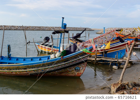 Many small fishing boats at the lake Many small fishing boats at the lake 65716621