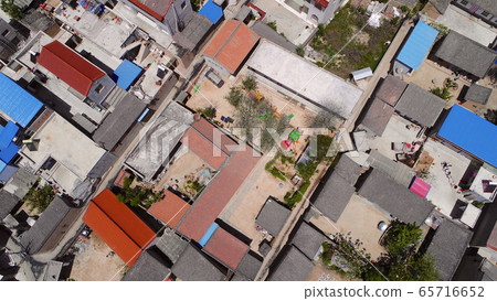 Aerial top view of small poor town houses in Gansu, China 65716652