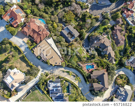 Aerial view of La Jolla little coastline city with wealthy villas and swimming pool.  65716822