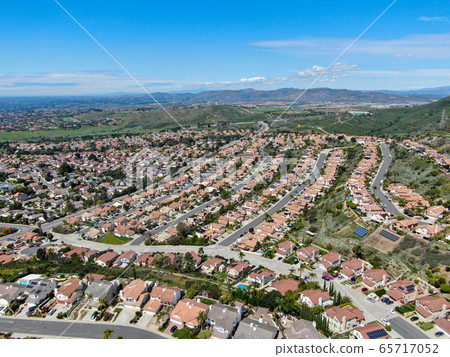Aerial view of upper middle class neighborhood in the valley during sunny day Aerial view of upper middle class neighborhood in the valley during sunny day 65717052