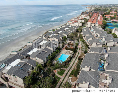 Aerial view of condo community next to the beach and sea in south california Aerial view of condo community next to the beach and sea in south california 65717563
