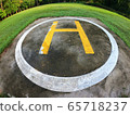 Closeup of helipad for landing helicopters on asphalt ground 65718237