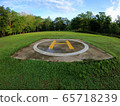 Closeup of helipad for landing helicopters on asphalt ground 65718239