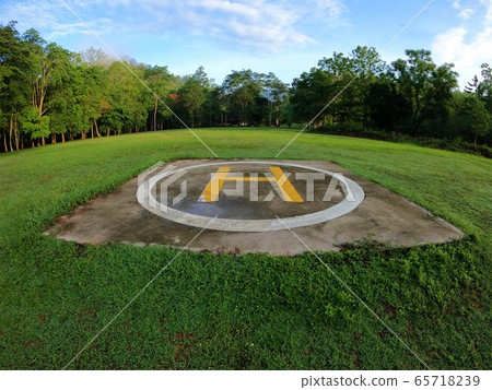 Closeup of helipad for landing helicopters on asphalt ground 65718239