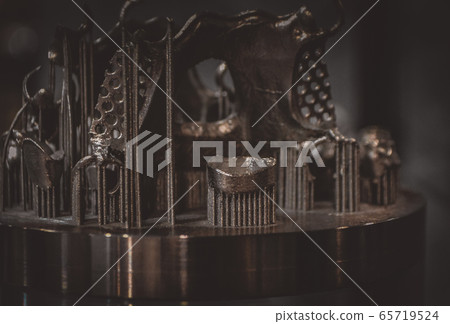 Object printed on metal 3d printer close-up Object printed on metal 3d printer close-up 65719524