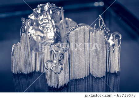 Object printed on metal 3d printer close-up Object printed on metal 3d printer close-up 65719573