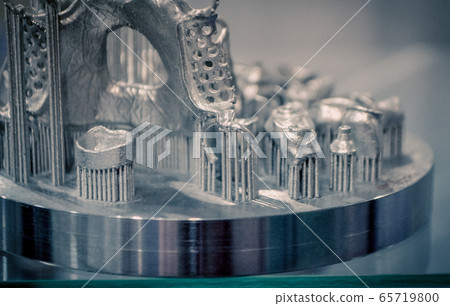 Object printed on metal 3d printer close-up Object printed on metal 3d printer close-up 65719800