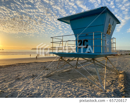 Lifeguard tower on the Coronado Beach during sunset time 65720817