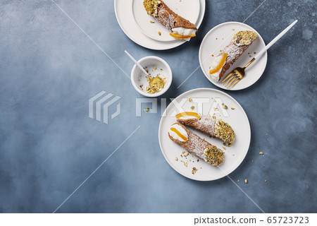 Traditional italian dessert cannoli siciliani 65723723