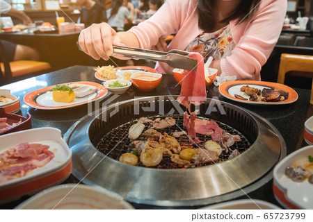 Raw beef and pork slice on grille for barbecue or Raw beef and pork slice on grille for barbecue or 65723799