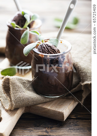 Sweet chocolate ice cream with sage 65725409