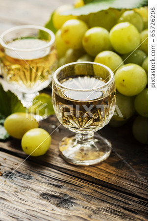 Typical Italian gold grappa Typical Italian gold grappa 65726208