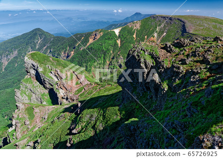 View of the Yatsugatake Mountain Range / Yokodake Iwamine and Iodake / Tateshina Mountain 65726925