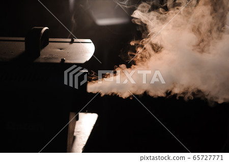 lights in smoke, studio lights shining through the smoke from smoke machine. 65727771
