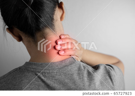 Woman with pain in neck. Woman with pain in neck. 65727923