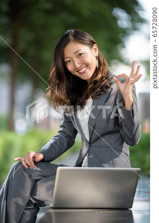 Businesswoman celebrate success Businesswoman celebrate success 65728090