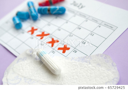 Menstrual pads and tampons on menstruation period Menstrual pads and tampons on menstruation period 65729425