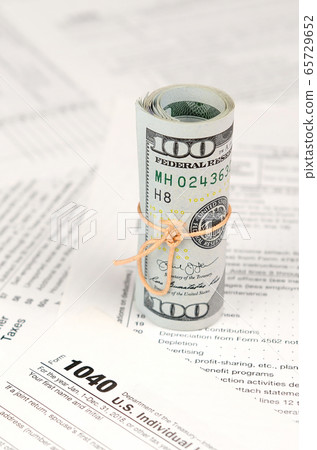 1040 Individual income tax return form with roll 1040 Individual income tax return form with roll 65729652