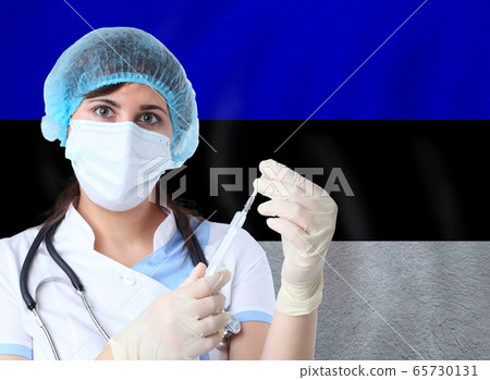 Scientist woman with test tube Coronavirus  65730131
