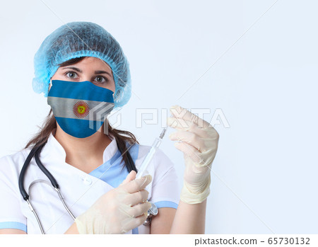 Scientist woman and mask with Argentina flag. 65730132