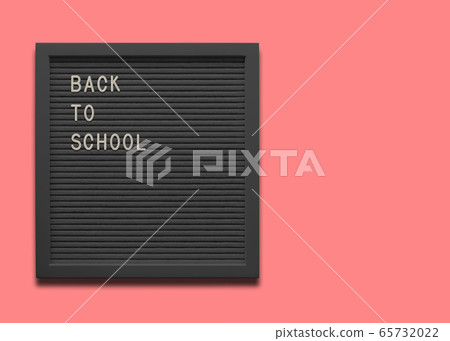 Text Back to school black message board on the pink background Text Back to school black message board on the pink background 65732022