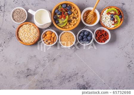 Healthy breakfast ingredients, top view. Healthy breakfast ingredients, top view. 65732698