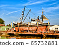 Fishing boat in a shipyard in Buesum on the North Sea in Germany 65732881