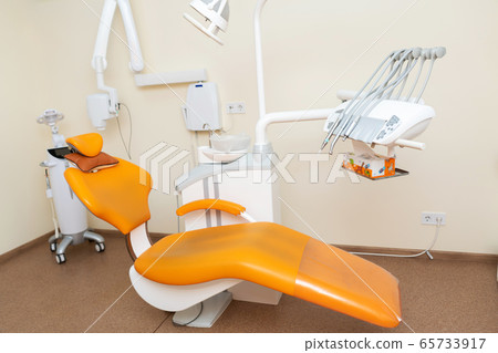Interior stylish modern dentist office in orange Interior stylish modern dentist office in orange 65733917