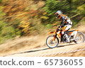The motorcyclist is landing. Motocross. Sports. A 65736055
