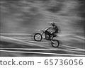 The motorcyclist is landing. Motocross. Sports. A 65736056