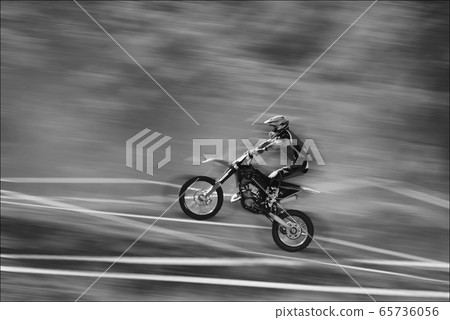 The motorcyclist is landing. Motocross. Sports. A 65736056