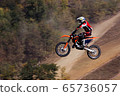The motorcyclist in flight. Motocross. Sports. In 65736057