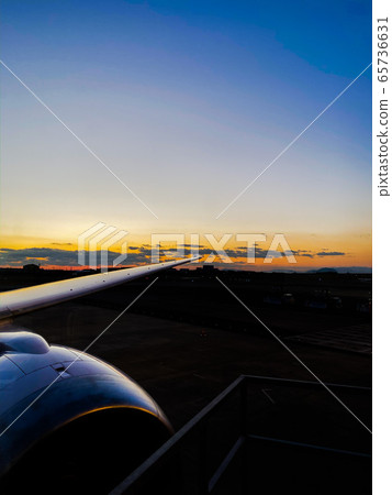 Sunset from airplane 65736631