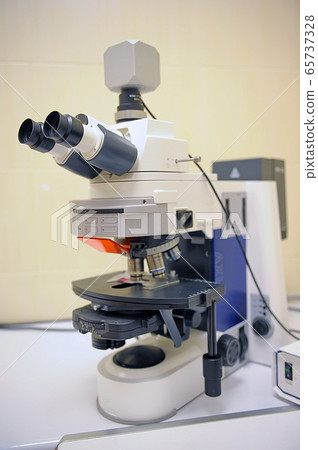 Laboratory Microscope. Scientific and healthcare research background. Laboratory Microscope. Scientific and healthcare research background. 65737328