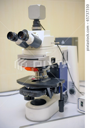 Laboratory Microscope. Scientific and healthcare research background. Laboratory Microscope. Scientific and healthcare research background. 65737330
