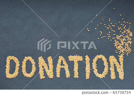 the word donate made from cereals on a black background the word donate made from cereals on a black background 65738754