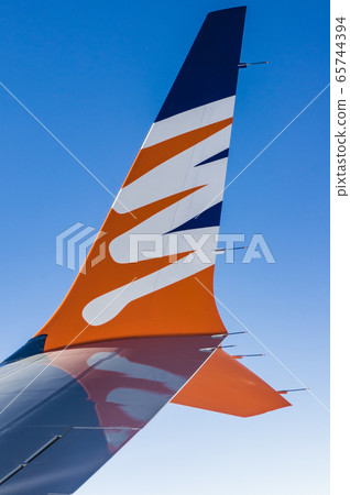 View from airplane window to see sky on evening time. View from airplane window to see sky on evening time. 65744394
