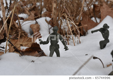 Miniature Army Men Marching Through the Snow Miniature Army Men Marching Through the Snow 65744996