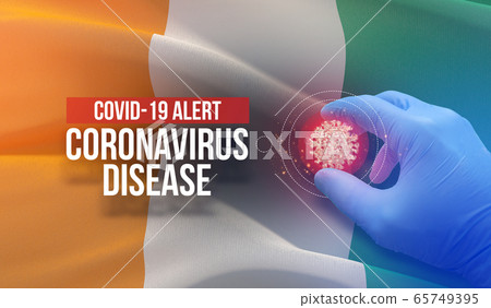 COVID-19 alert, coronavirus disease - letter typography text. Medical virus molecular concept with flag of Cote Ivoire. Pandemic 3D illustration. 65749395