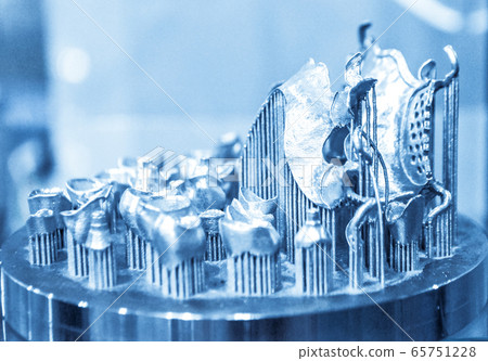 Object printed on metal 3d printer close-up. 65751228