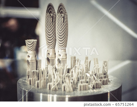 Object printed on metal 3d printer close-up Object printed on metal 3d printer close-up 65751264