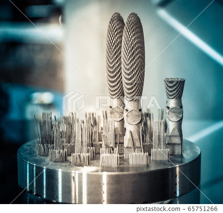 Object printed on metal 3d printer close-up Object printed on metal 3d printer close-up 65751266
