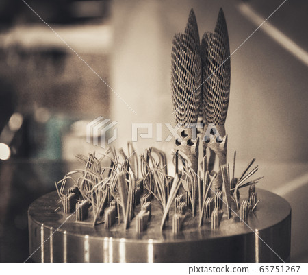 Object printed on metal 3d printer close-up. Object printed on metal 3d printer close-up. 65751267