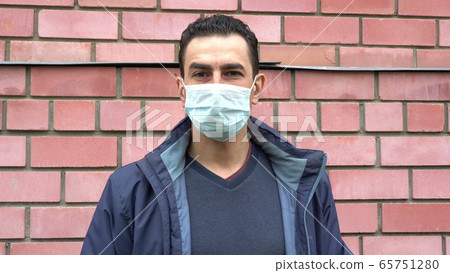 Masked man wearing boxing gloves, getting crazy, show fuck off to camera, hypochondriac, paranoia Masked man wearing boxing gloves, getting crazy, show fuck off to camera, hypochondriac, paranoia 65751280