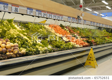Display fresh vegetable on rack for sale inside superstore Display fresh vegetable on rack for sale inside superstore 65752631