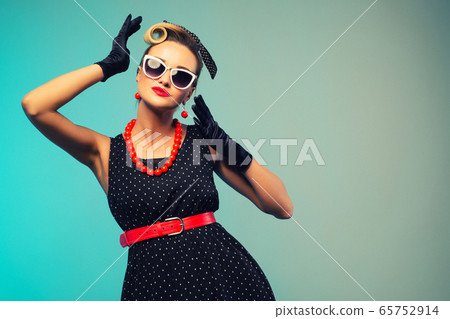 Funny retro portraits. Pin up woman dressing 65752914
