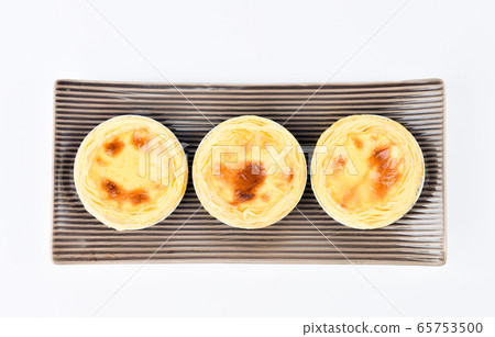 Egg tart, traditional Portuguese dessert Egg tart, traditional Portuguese dessert 65753500